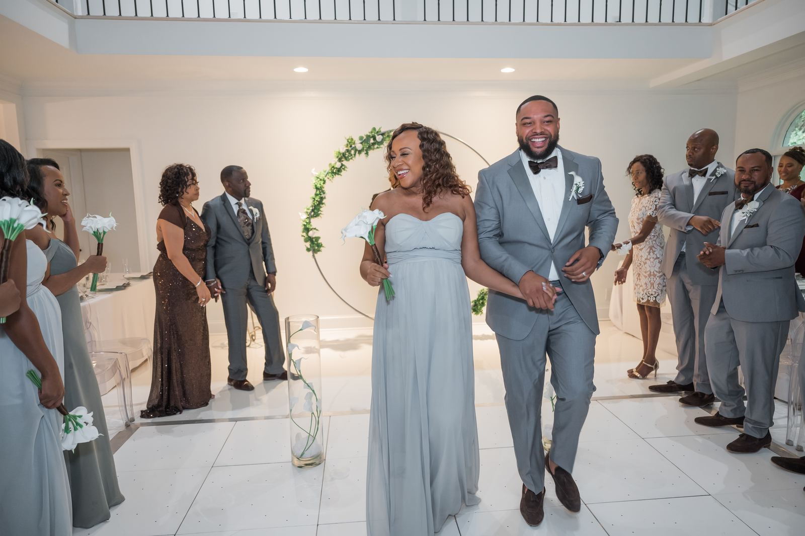 Anjanette and Ritchie walking back up the aisle