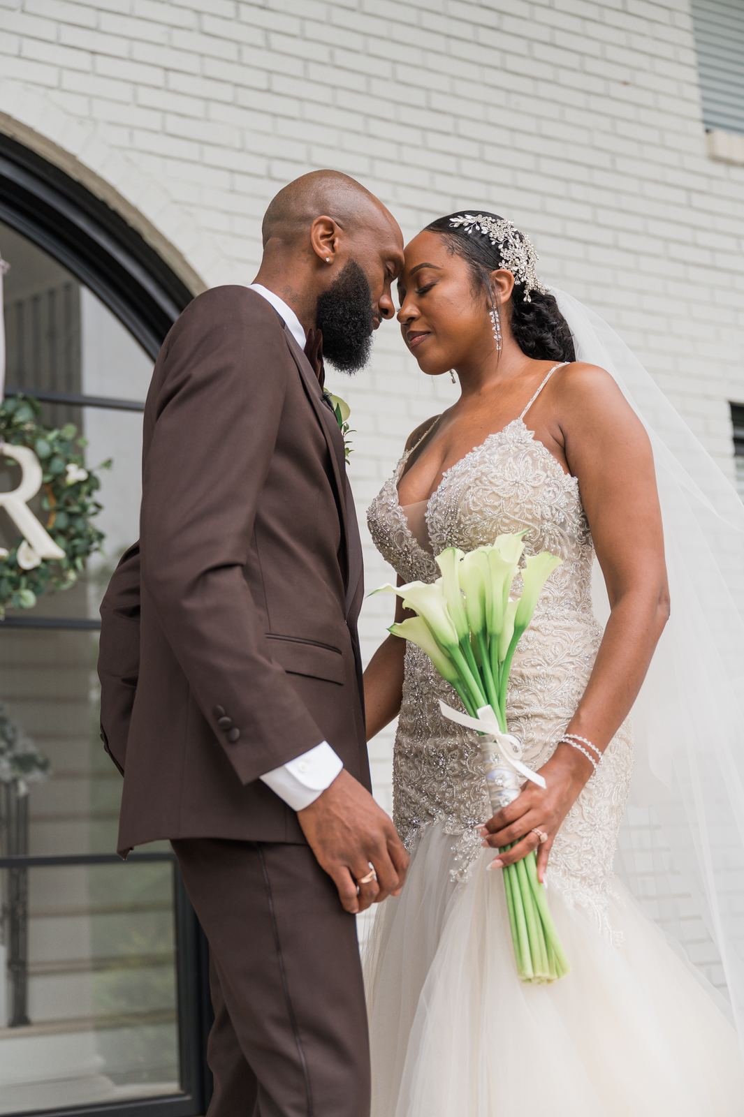 Anjanette and Ritchie forehead to forehead