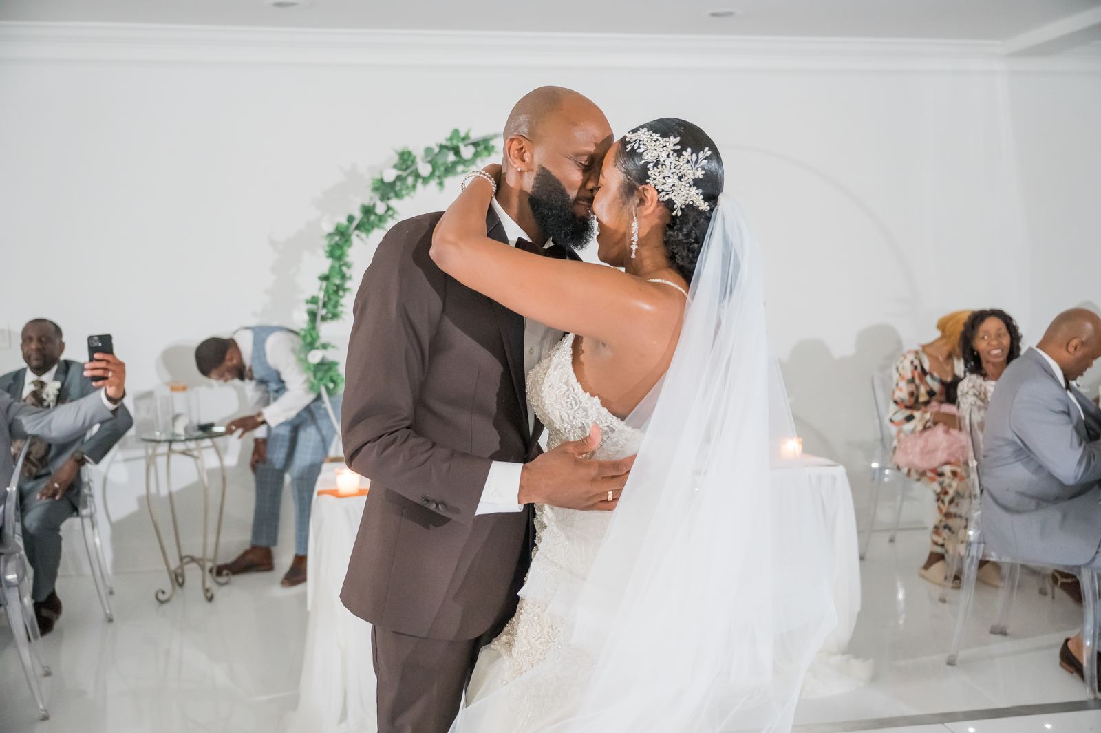 Anjanette and Ritchie kissing at the hoop
