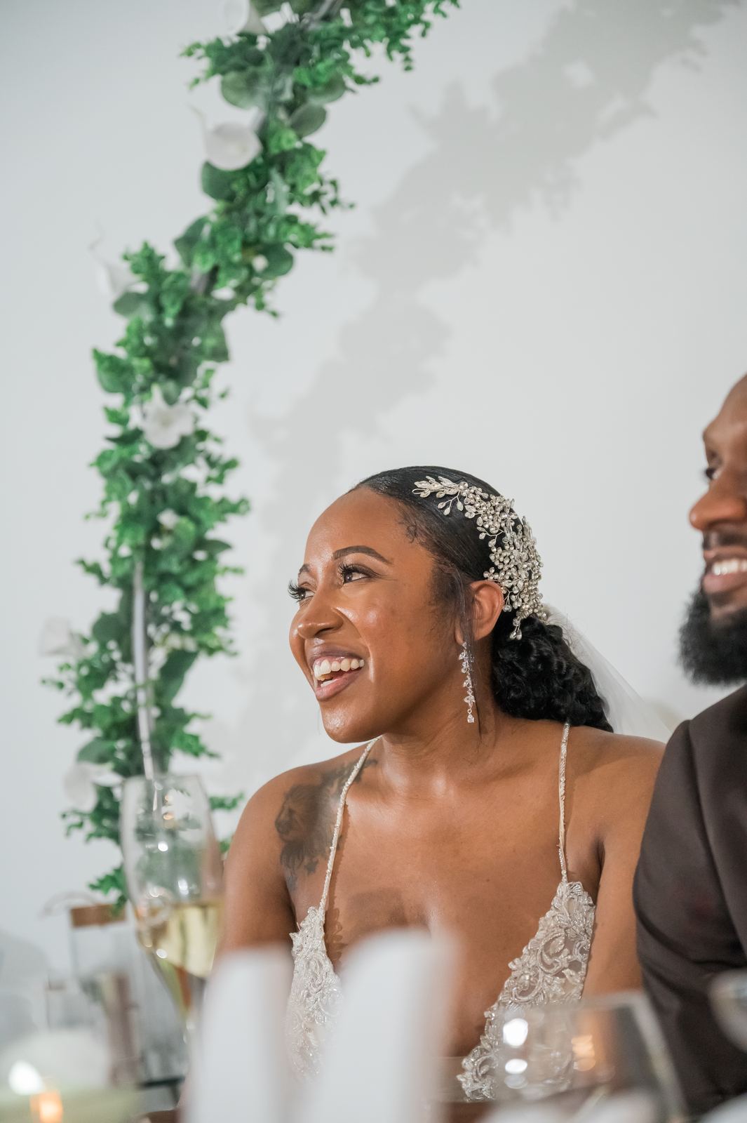Anjanette laughing at the head table