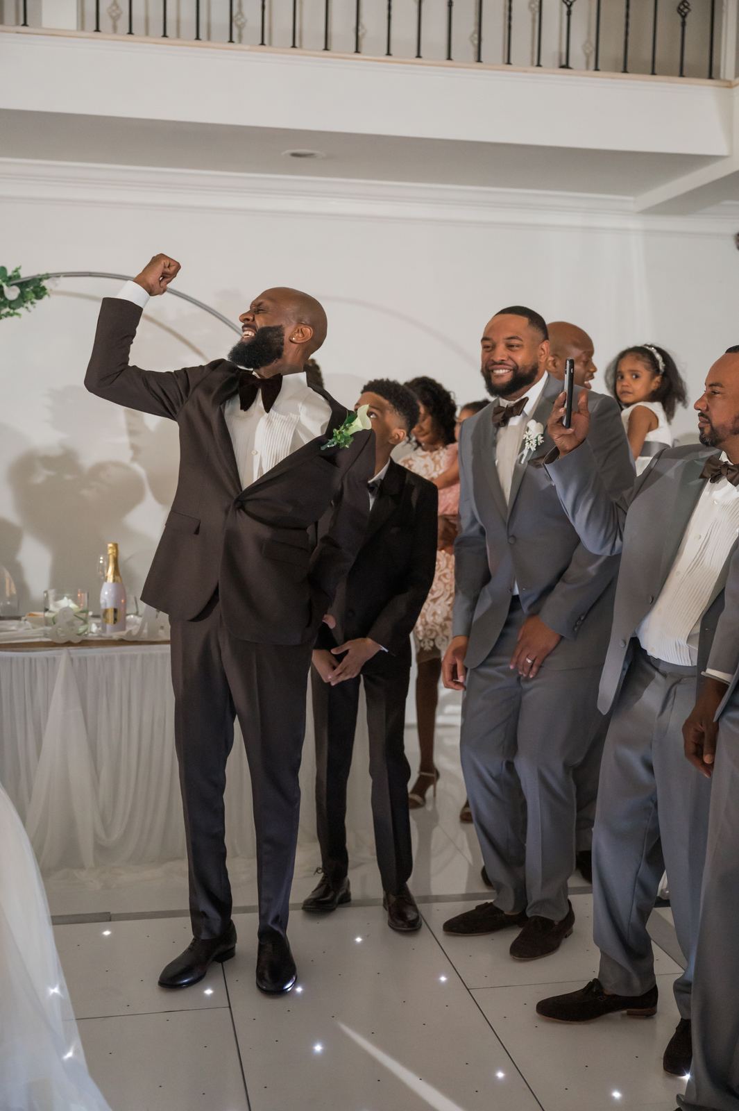 Groomsmen cheering