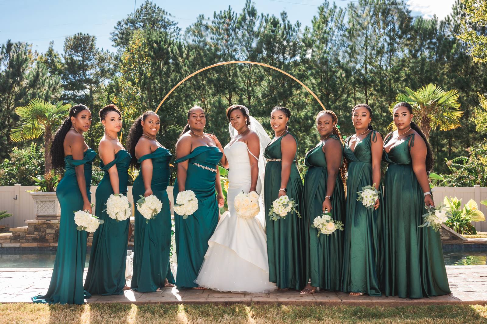 Bridesmaids at the arch