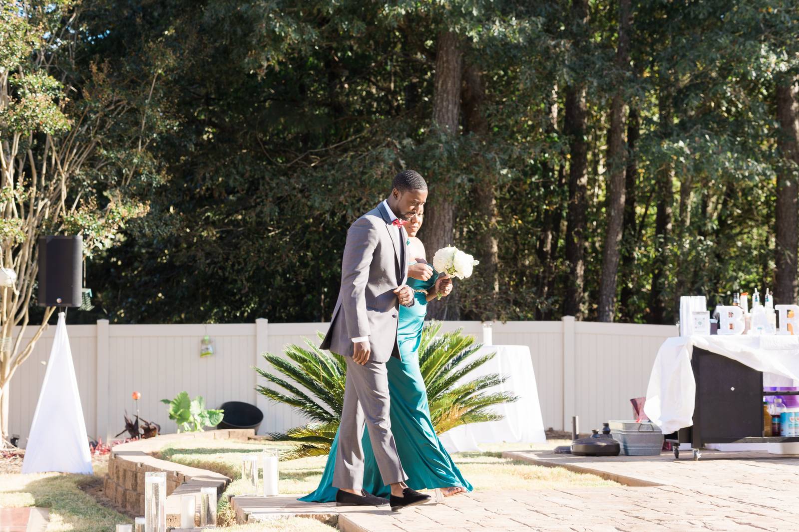 Bridesmaid walking to the ceremony