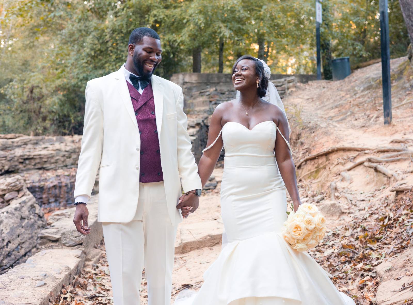 Christina and Darius walking the rocks