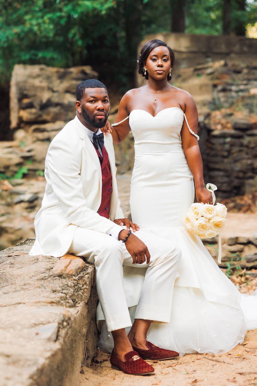 Christina and Darius on the stone wall