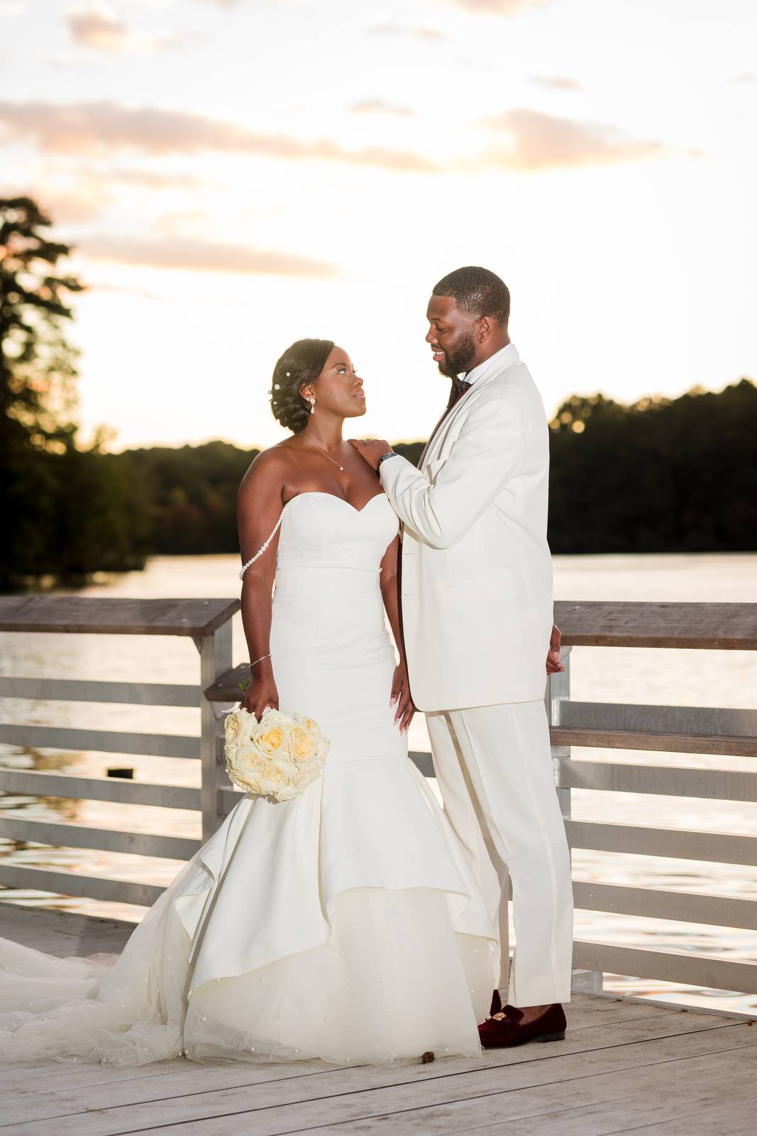 Christina and Darius at sunset on the dock