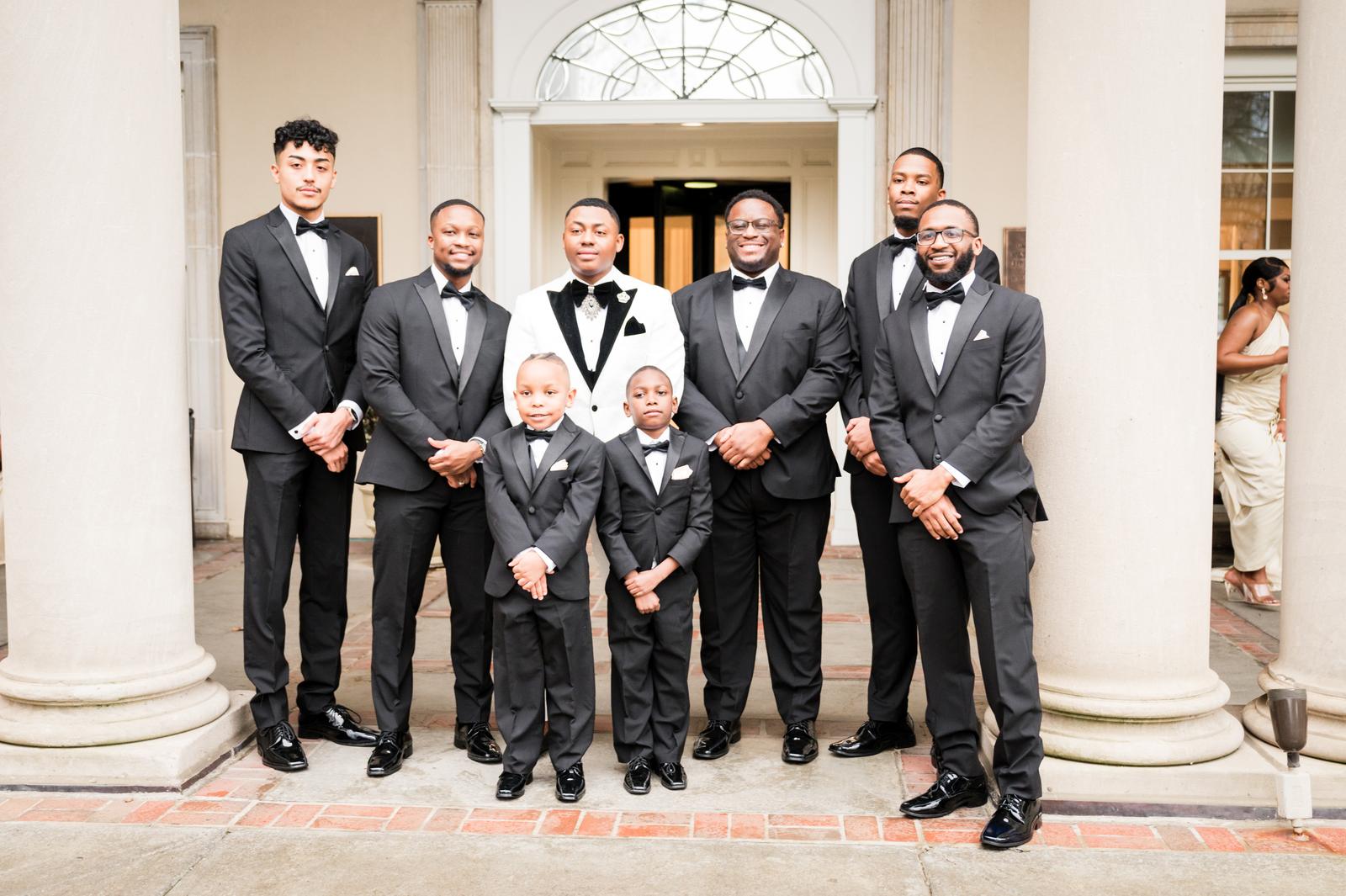 Kordel with his groomsmen at the columns