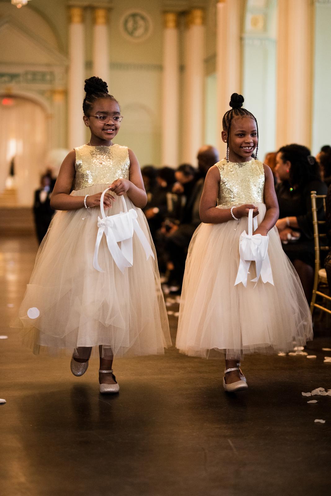 Flower girls walking the aisle