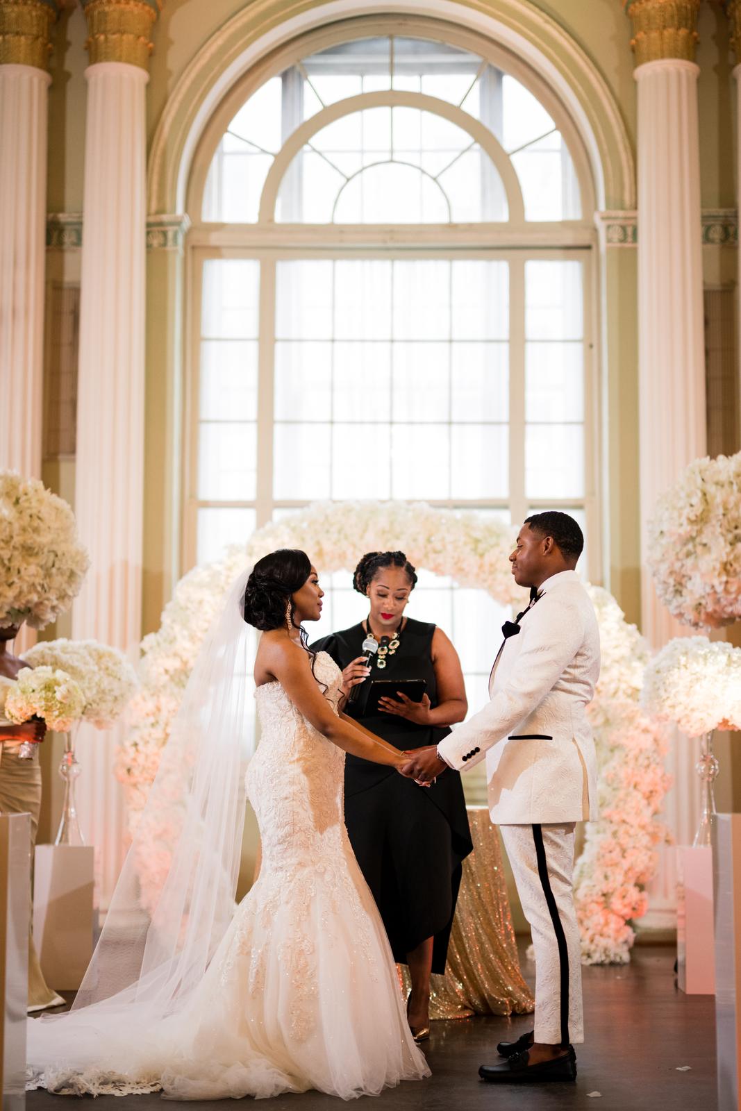 Haley and Kordel at the floral arch