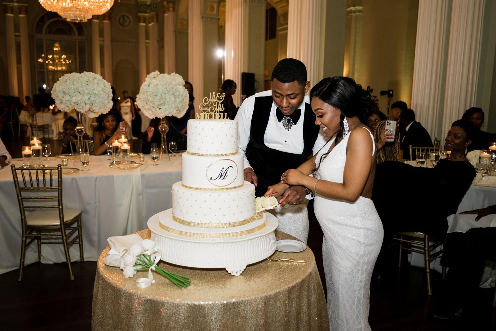 Haley and Kordel cutting the cake