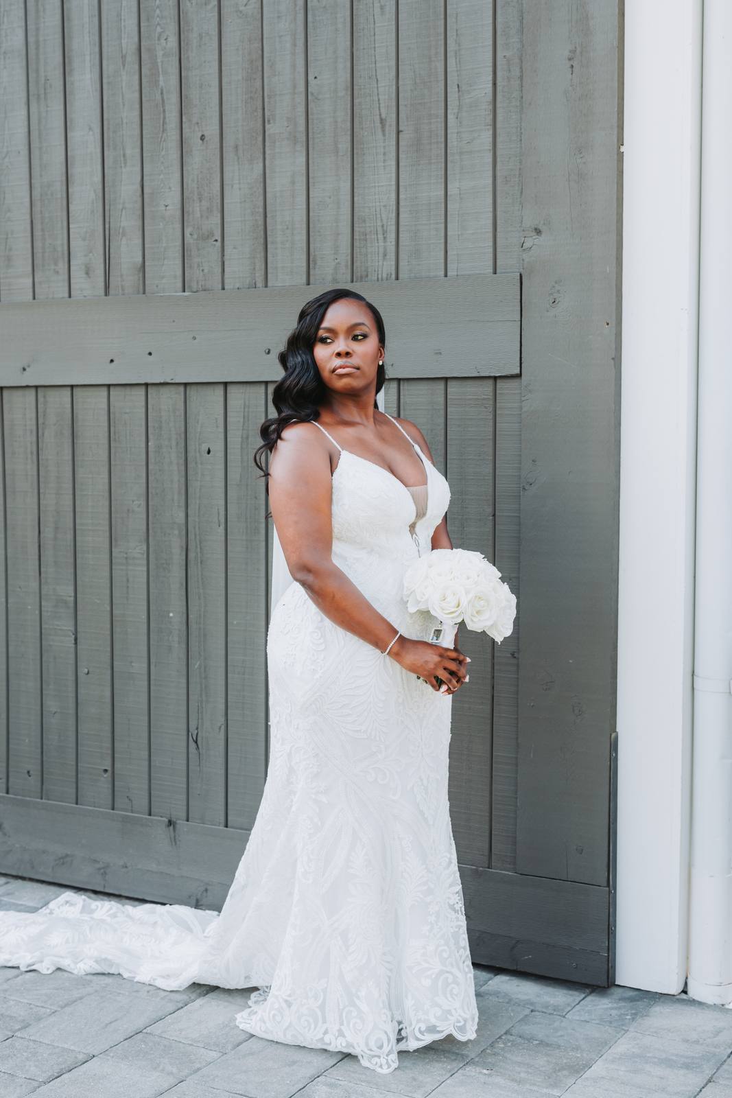 Latisha against the barn doors