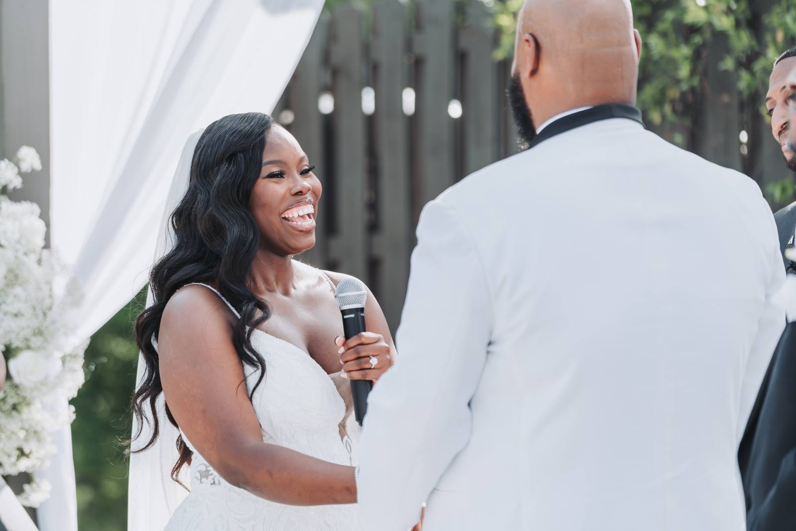 Latisha laughing during the vows