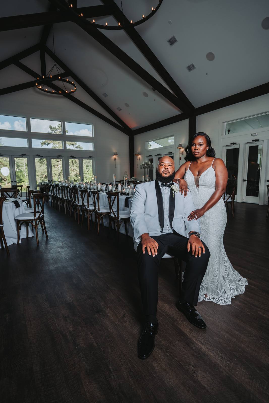 Latisha and Nate seated in the reception hall
