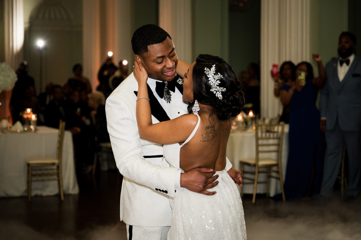 Haley and Kordel's first dance in warm uplight